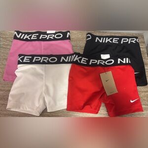 Nike Kids Pro Shorts - Red, Pink, Black, and White